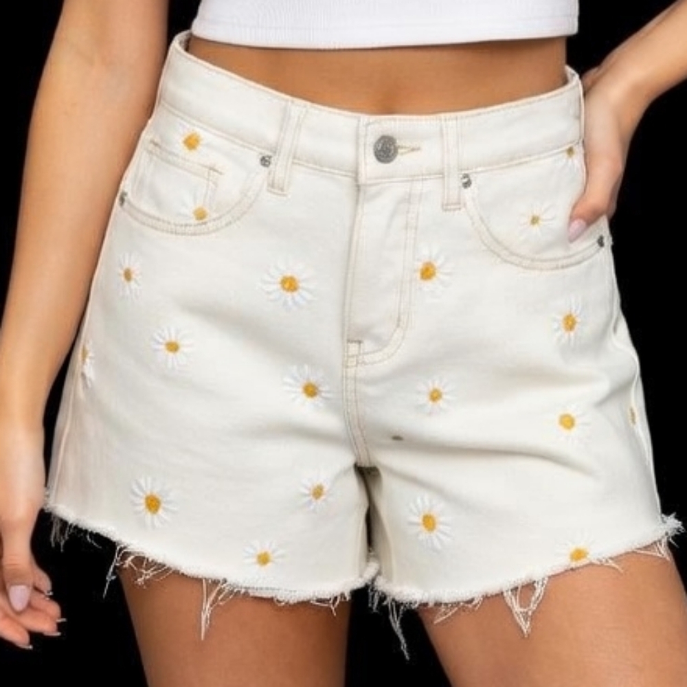 Embroidered floral daisy cream distressed raw edge frayed denim shorts